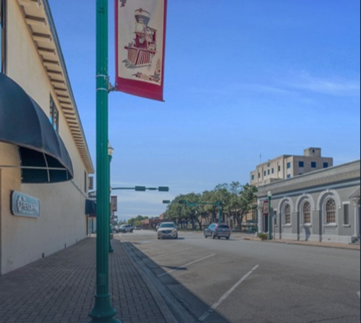 Historic storefronts along the downtown Conroe streetscape